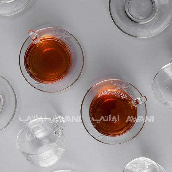 Elegant Clear Tea Glass & Saucer Set – Clear Trim & Impressed Leaf Design
